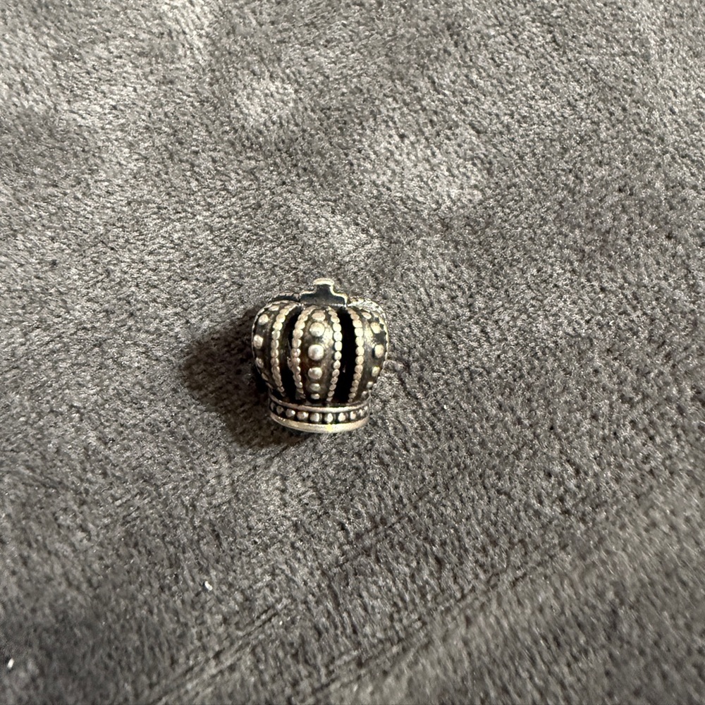 Pandora silver crown charm.